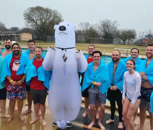Group of individuals participating in the Polar Bear Plunge