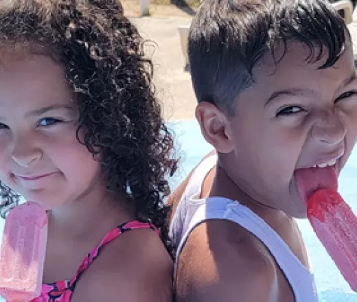 Boy & Girl enjoy a Popsicle at the Y